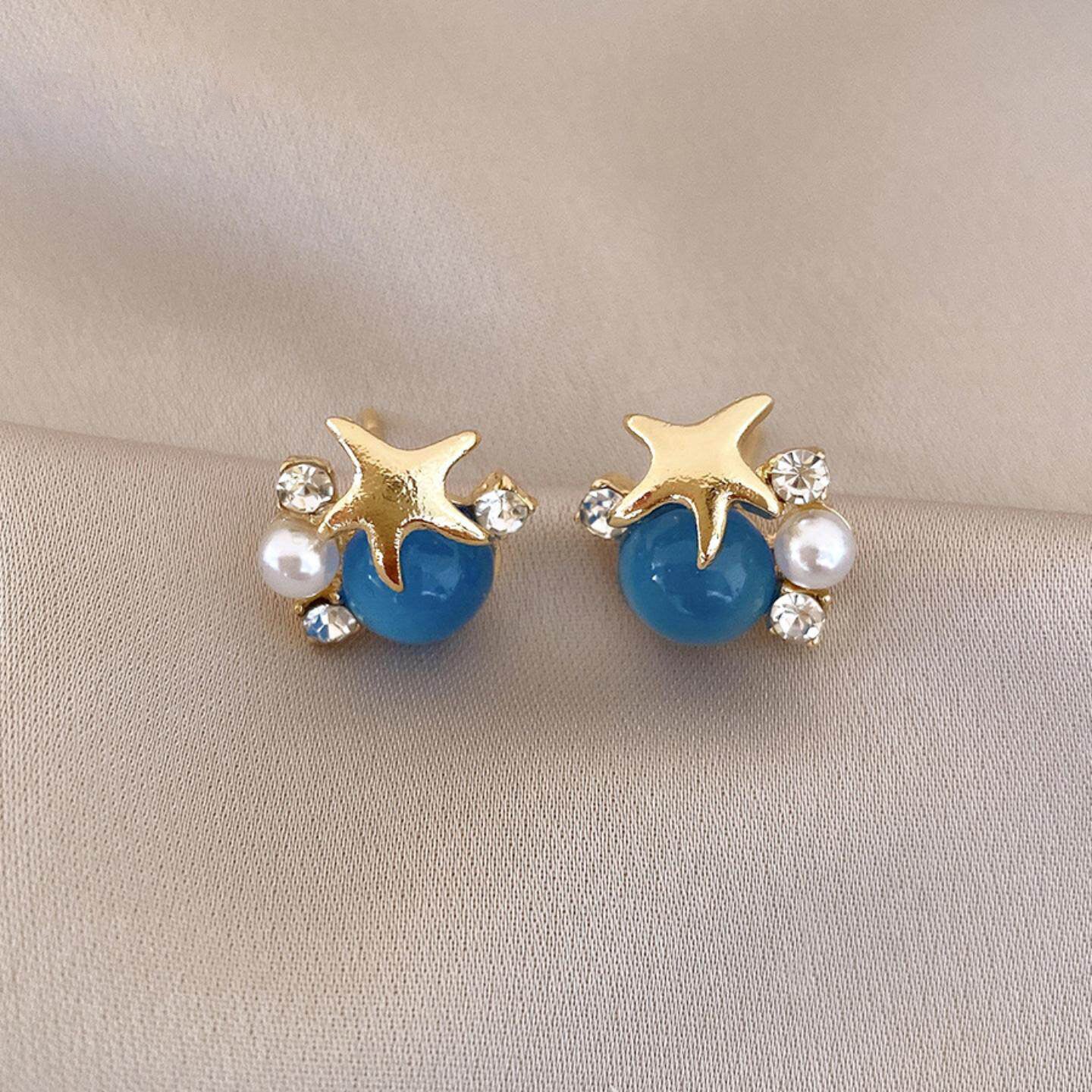 Ocean Vibes-örhängen med sjöstjärnor – örhängen med blå cabochoner och pärlor